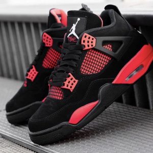 Jordan 4 Reps Red Thunder - Side view showcasing the bold design and iconic Jumpman logo